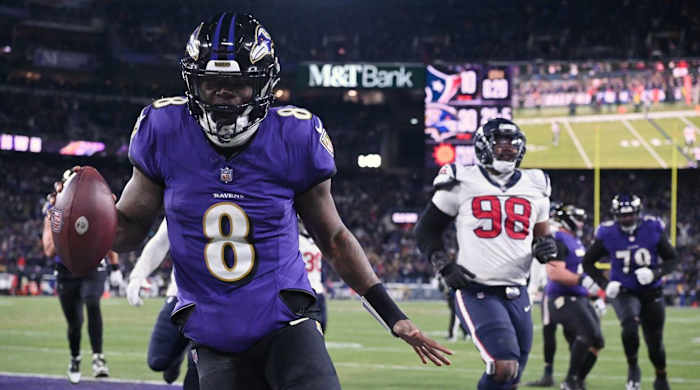 Lamar Jackson scores a touchdown against the Houston Texans.